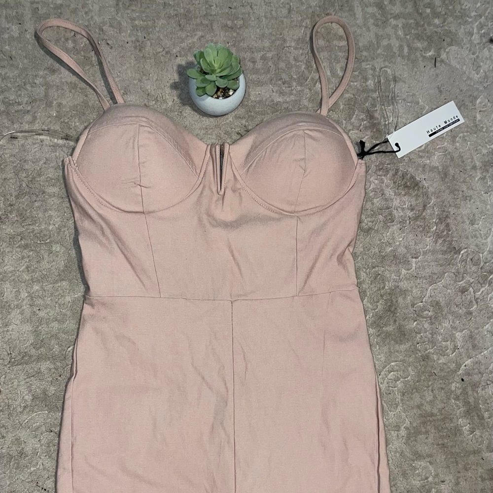 Beautiful nude bodysuit/short below knee.